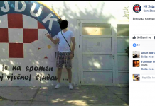 Srpski navijač i turist provocira pred muralom Vukovaru i Torcidi s uzdignuta tri prsta