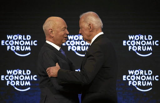 Klaus Schwab, Founder and Executive Chairman, World Economic Forum welcomes Joe Biden, Vice President of the United States at the annual meeting of the World Economic Forum (WEF) in Davos, Switzerland January 18, 2017. REUTERS/Ruben Sprich